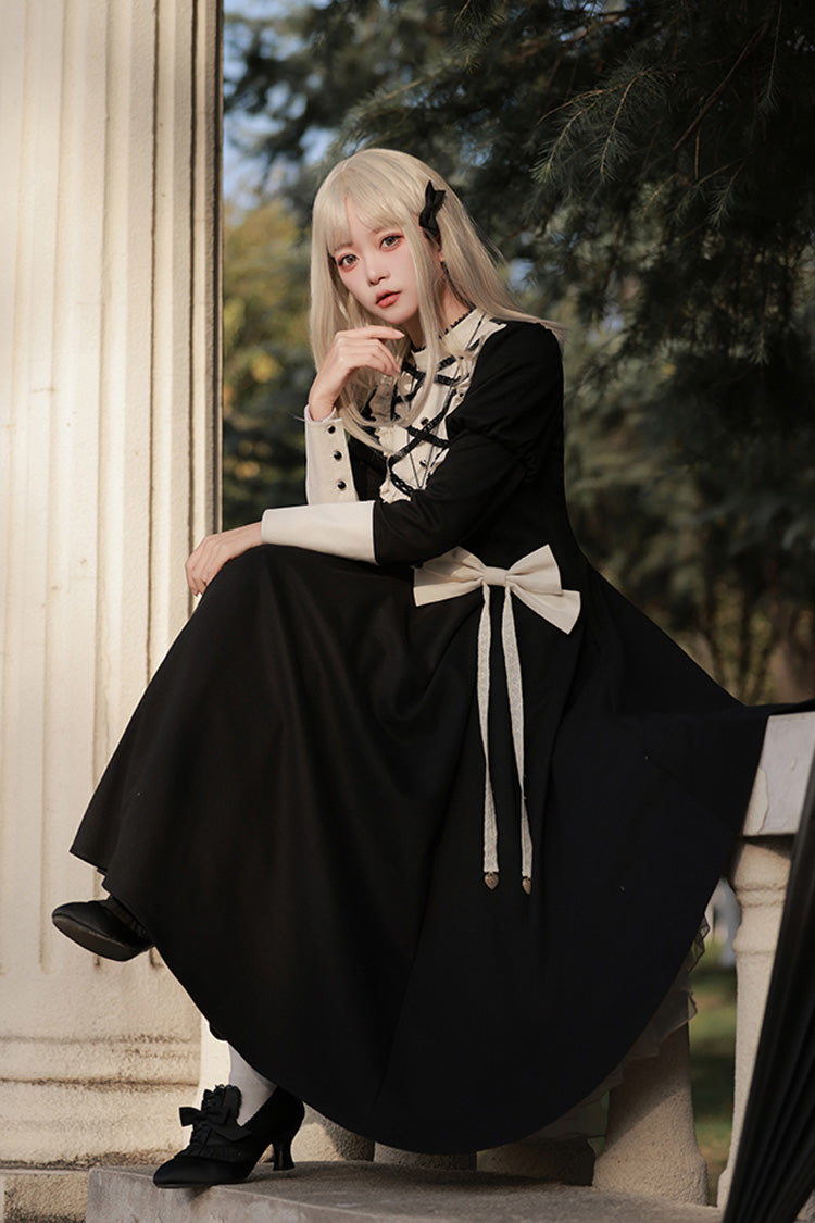 Schwarzes Lolita-Kleid im Nonnenstil mit Stehkragen und langen Ärmeln, Rüschen und Schleife