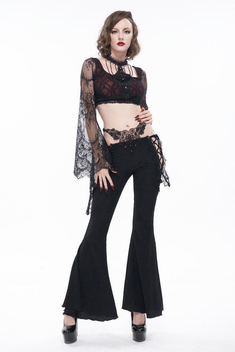 Schwarze, tief sitzende, beidseitig mit Spitze und Edelsteinen verzierte, ausgestellte Gothic-Hose für Damen mit Cut-outs und Schnürung