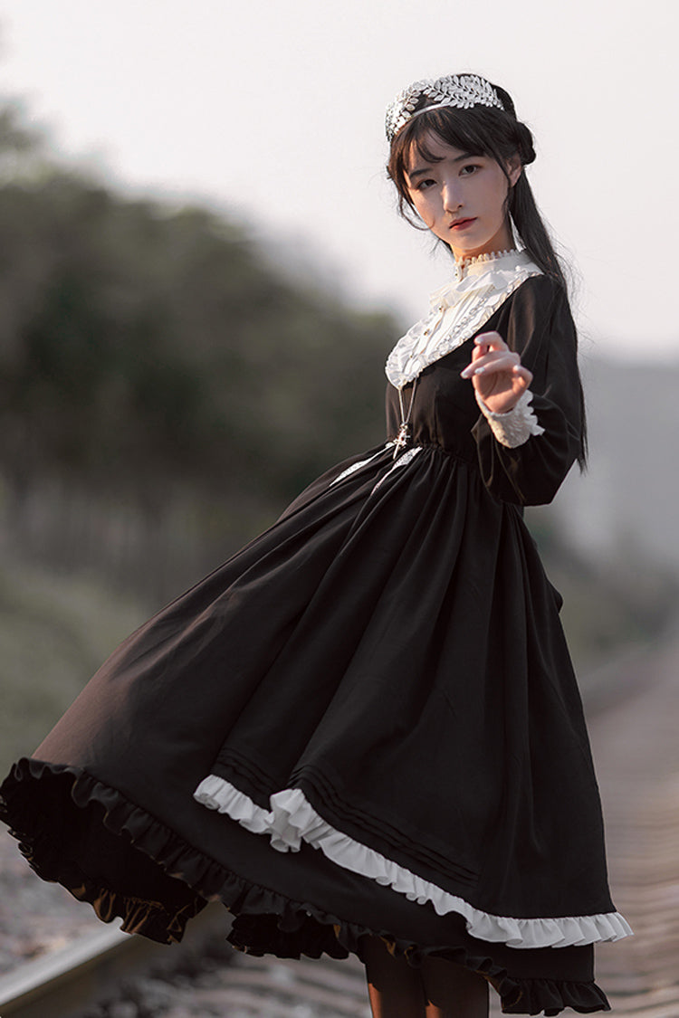 Schwarzes Gothic Lolita-Stufenkleid mit Schleife und Rüschen